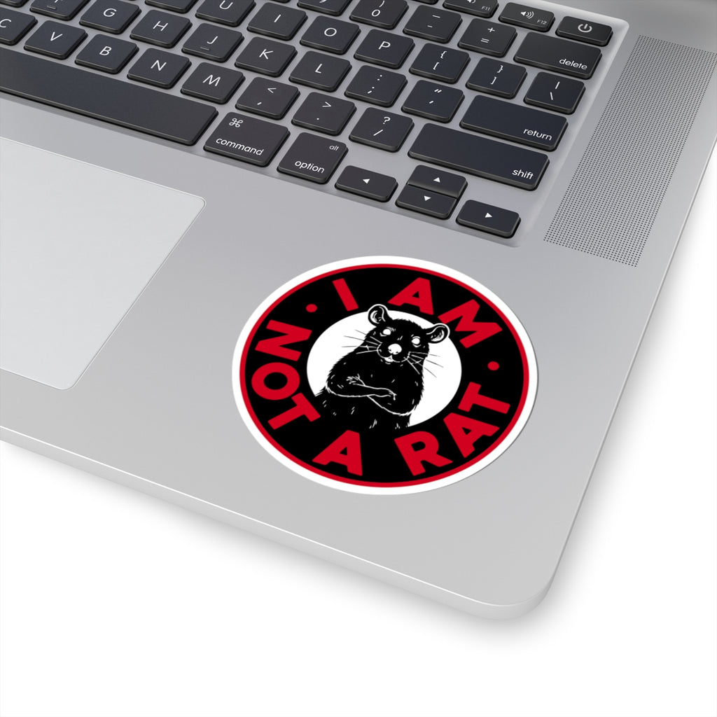 Laptop with a 'I AM NOT A RAT' sticker on the palm rest area